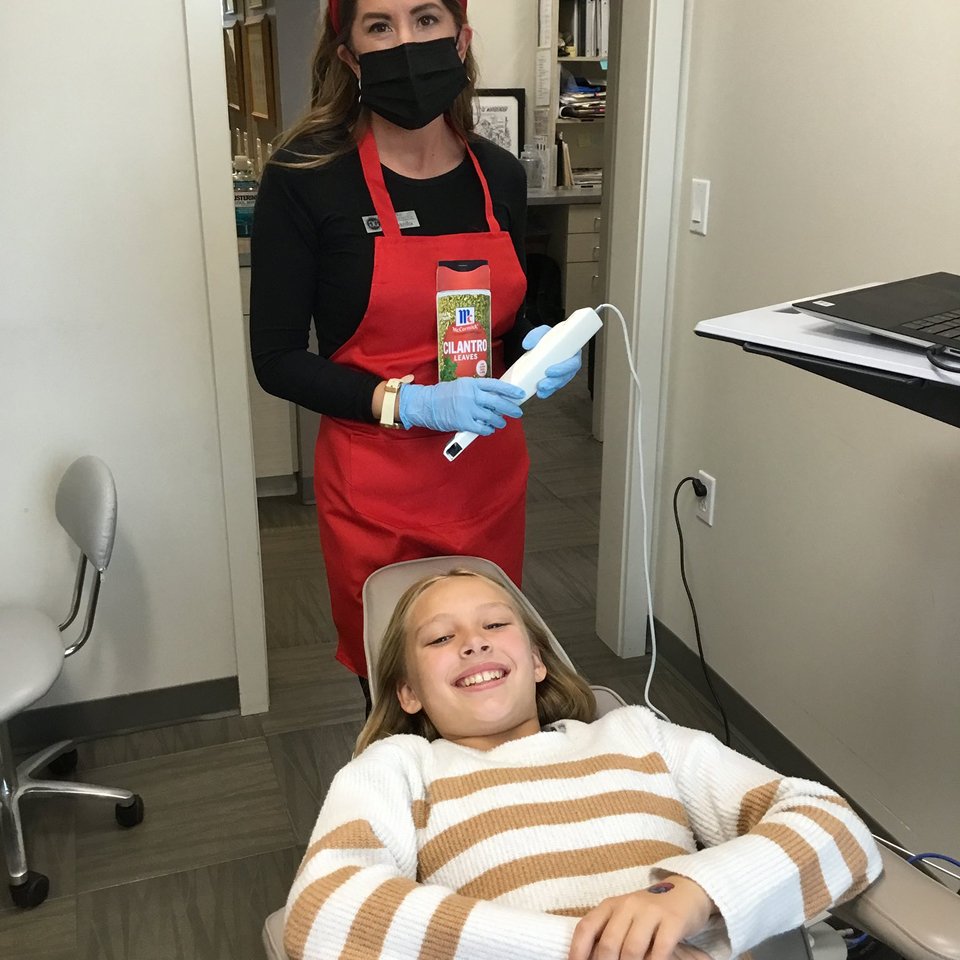 Patient receiving cone beam CT scan at orthodontic practice